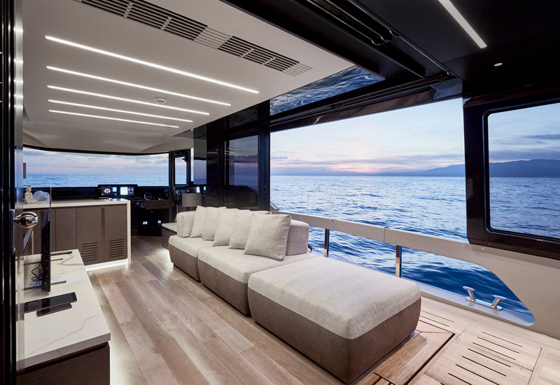 Explorer 62 Luxury Yacht Main Saloon Lounge with Large Windows by Yacht Designer Marco Parentela