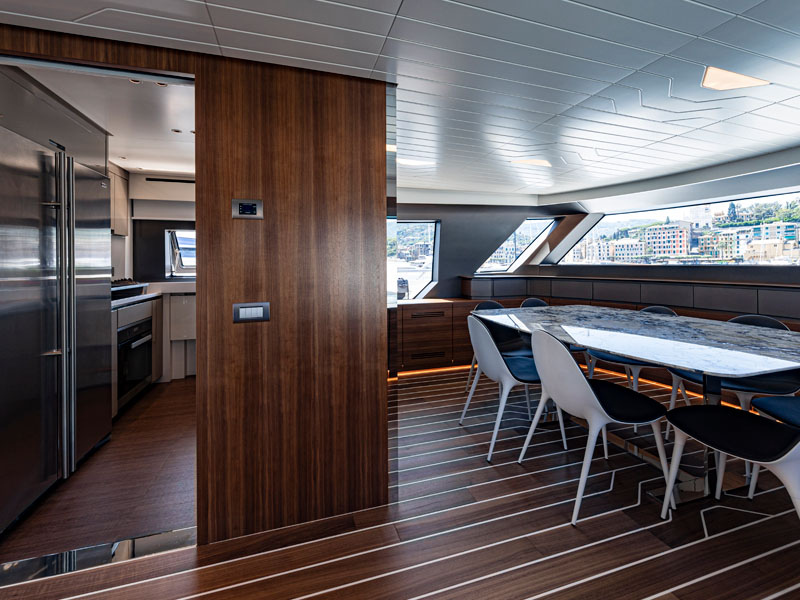 Sanlorenzo SX76 Dining Area with Marble Table Designed by Marco Parentela Italian Yacht Designer