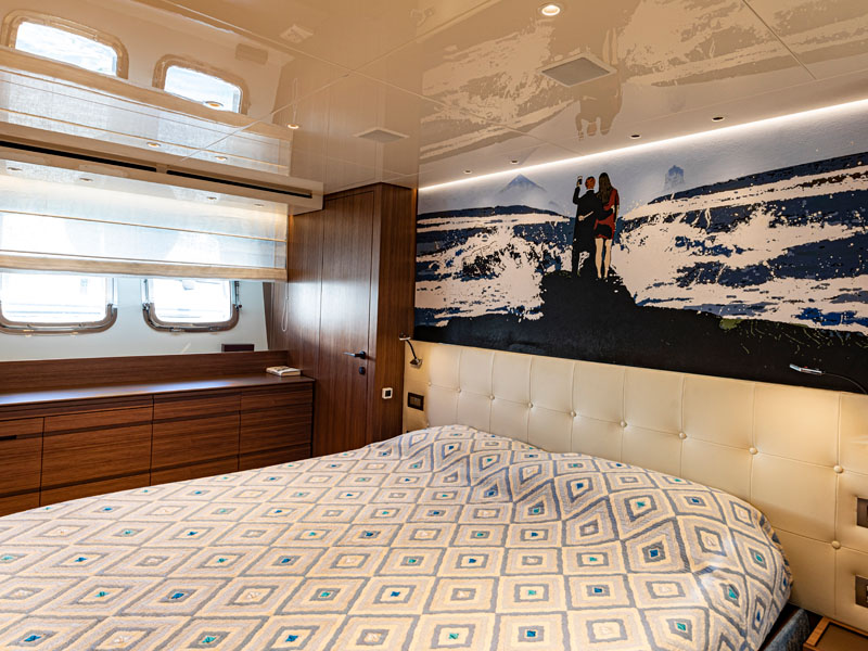 Sanlorenzo SX76 Yacht Owner Cabin with Padded Headboard and Contemporary Mural Designed by Marco Parentela Yacht Designer